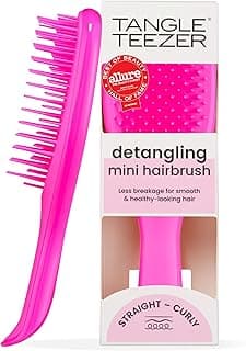 Escova de cabelo desembaraçadora The Mini Ultimate Detangler para todos os tipos de cabelo, ideal para o uso em fios úmidos. Cor: Rosa com 41.1% de desconto por R$ 85,41 na amazon